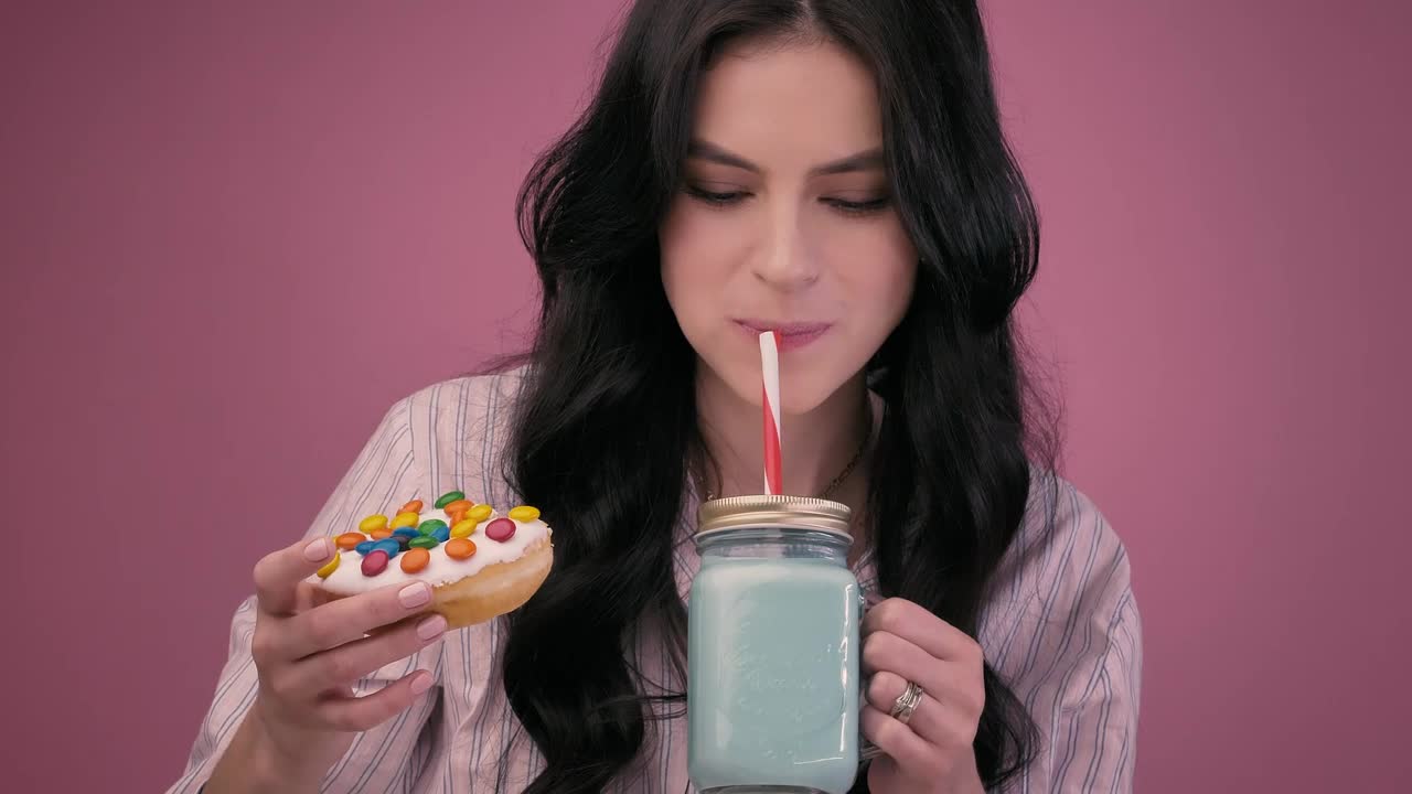 girl eating glazed donut milkshake 40831 medium – Fans PaySite Demo